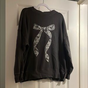 Black Sweatshirt with Floral Bow Design